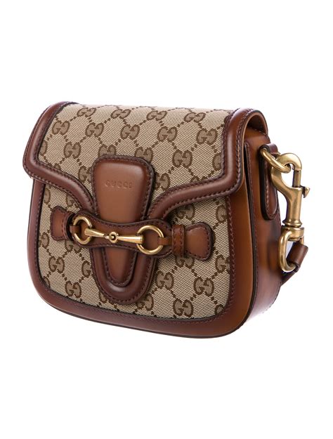 gucci bronze top handle crossbody|Gucci clutch bag.